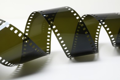 Photo of Strip of photographic film on white background