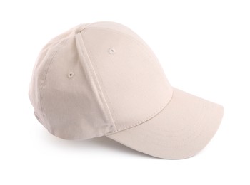 Photo of One beige baseball hat isolated on white
