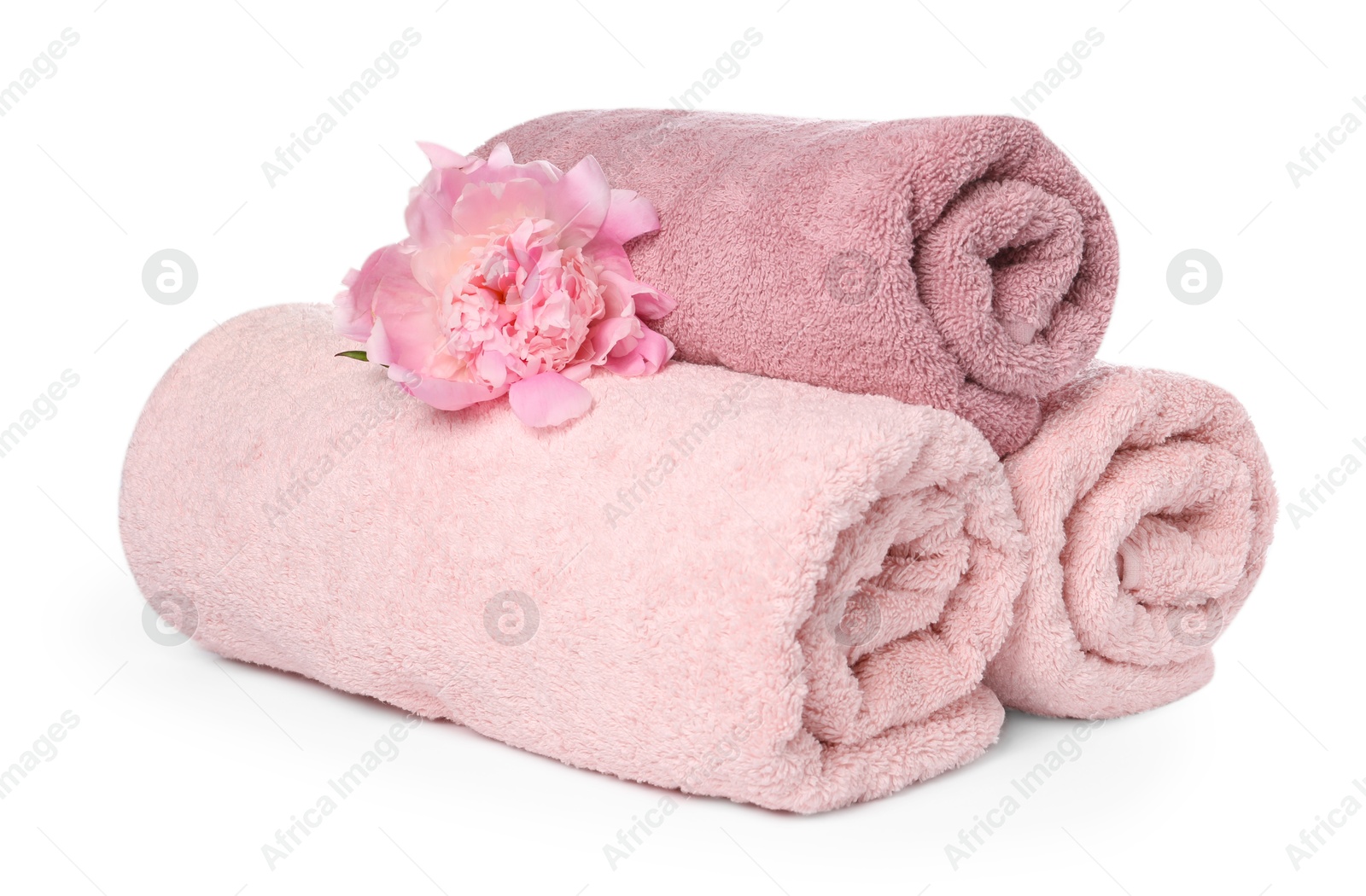 Photo of Soft towels and peony flower isolated on white