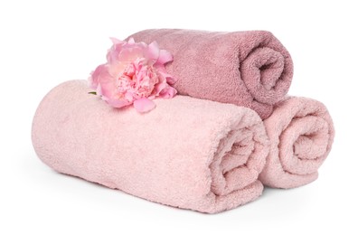 Photo of Soft towels and peony flower isolated on white