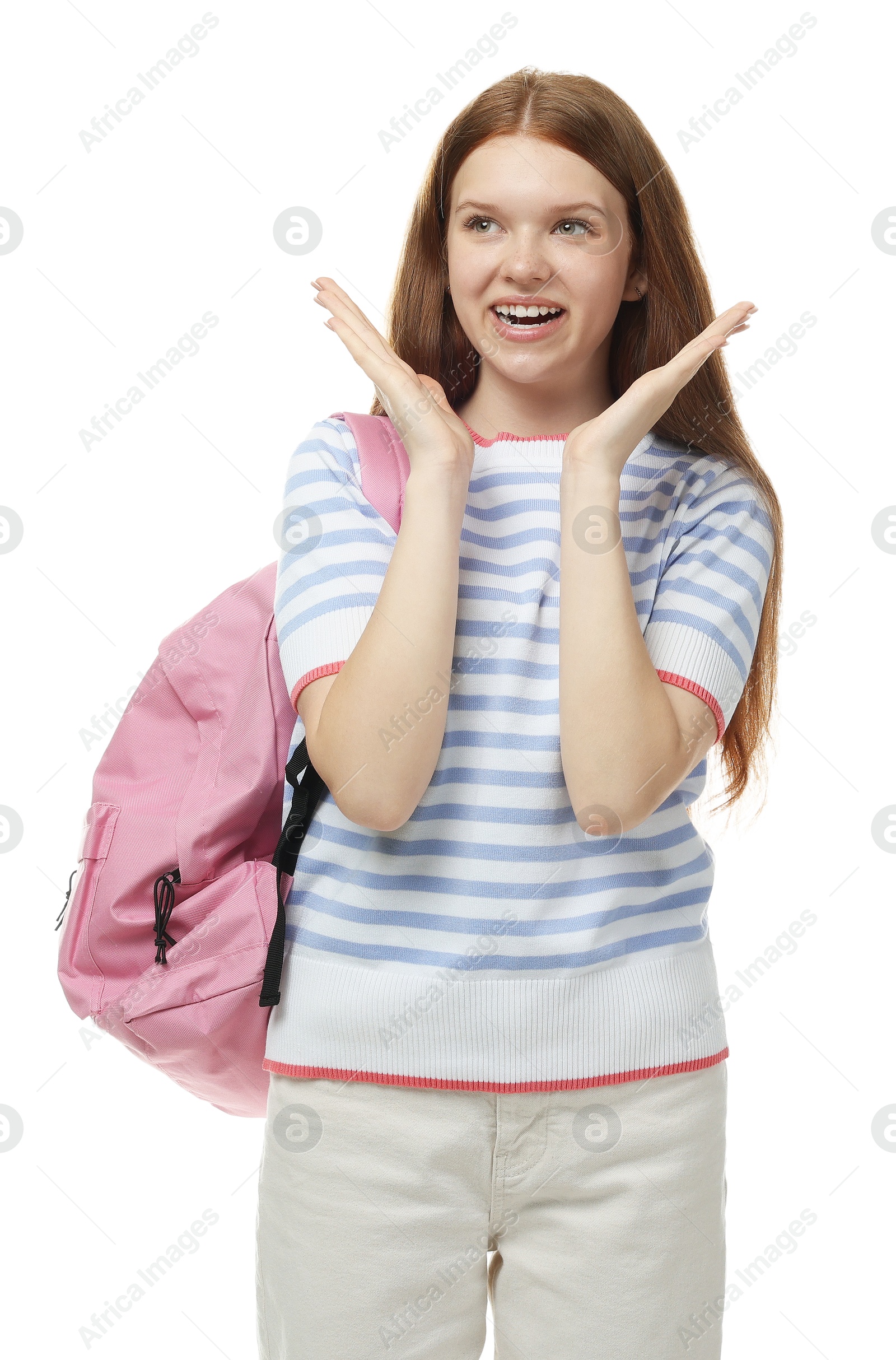 Emotional teenage girl with backpack on white background Photo of Emotional teenage girl with backpack on white background