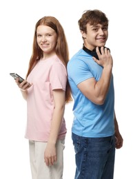 Photo of Teenagers with smartphone and headphones on white background