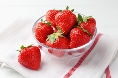 Photo of Fresh ripe strawberries on white table, closeup