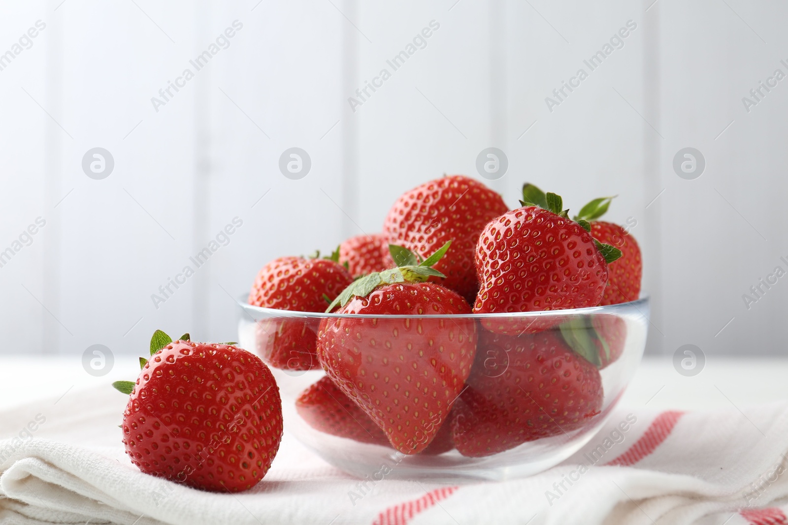 Fresh ripe strawberries on white table, closeup Photo of Fresh ripe strawberries on white table, closeup