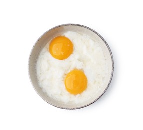 Photo of Half-boiled eggs in bowl isolated on white, top view. Traditional asian breakfast