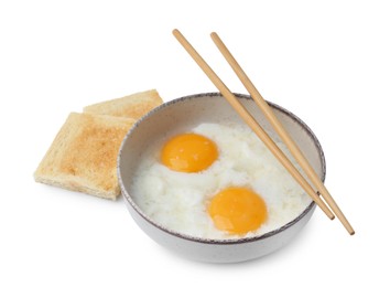 Photo of Half-boiled eggs in bowl, toasted bread and chopsticks isolated on white. Traditional asian breakfast