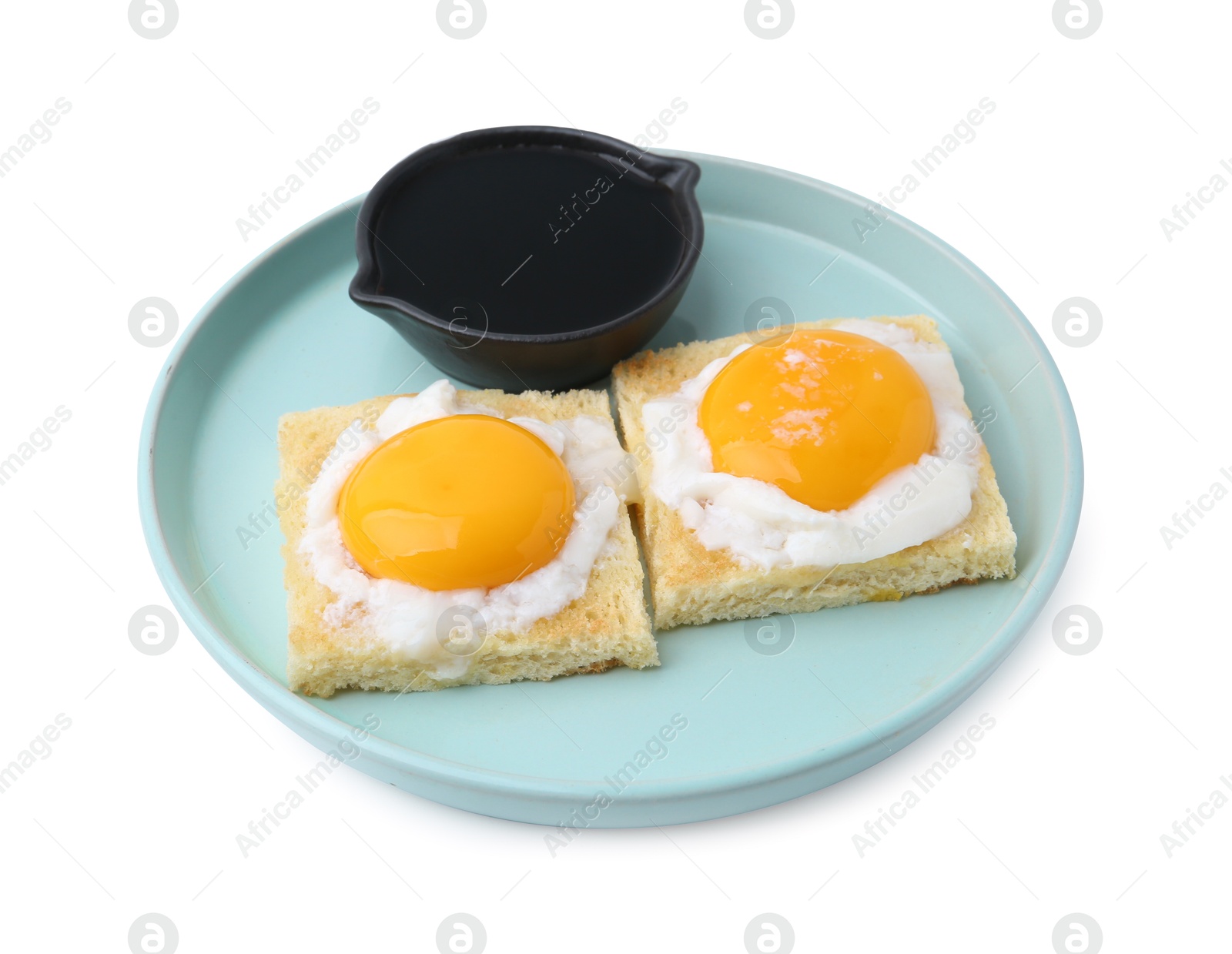 Tasty kaya toasts with half-boiled eggs and soy sauce isolated on white. Traditional asian breakfast Photo of Tasty kaya toasts with half-boiled eggs and soy sauce isolated on white. Traditional asian breakfast
