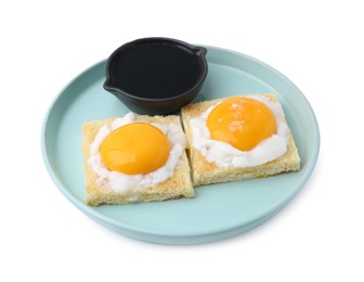 Photo of Tasty kaya toasts with half-boiled eggs and soy sauce isolated on white. Traditional asian breakfast