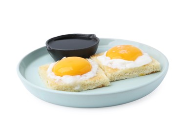 Photo of Tasty kaya toasts with half-boiled eggs and soy sauce isolated on white. Traditional asian breakfast