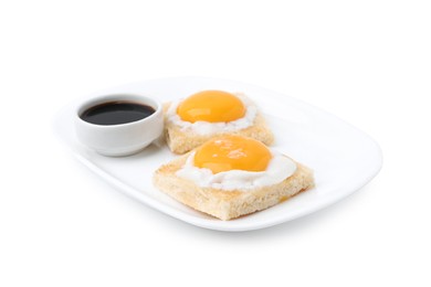Photo of Tasty kaya toasts with half-boiled eggs and soy sauce isolated on white. Traditional asian breakfast