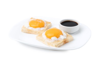 Photo of Tasty kaya toasts with half-boiled eggs and soy sauce isolated on white. Traditional asian breakfast