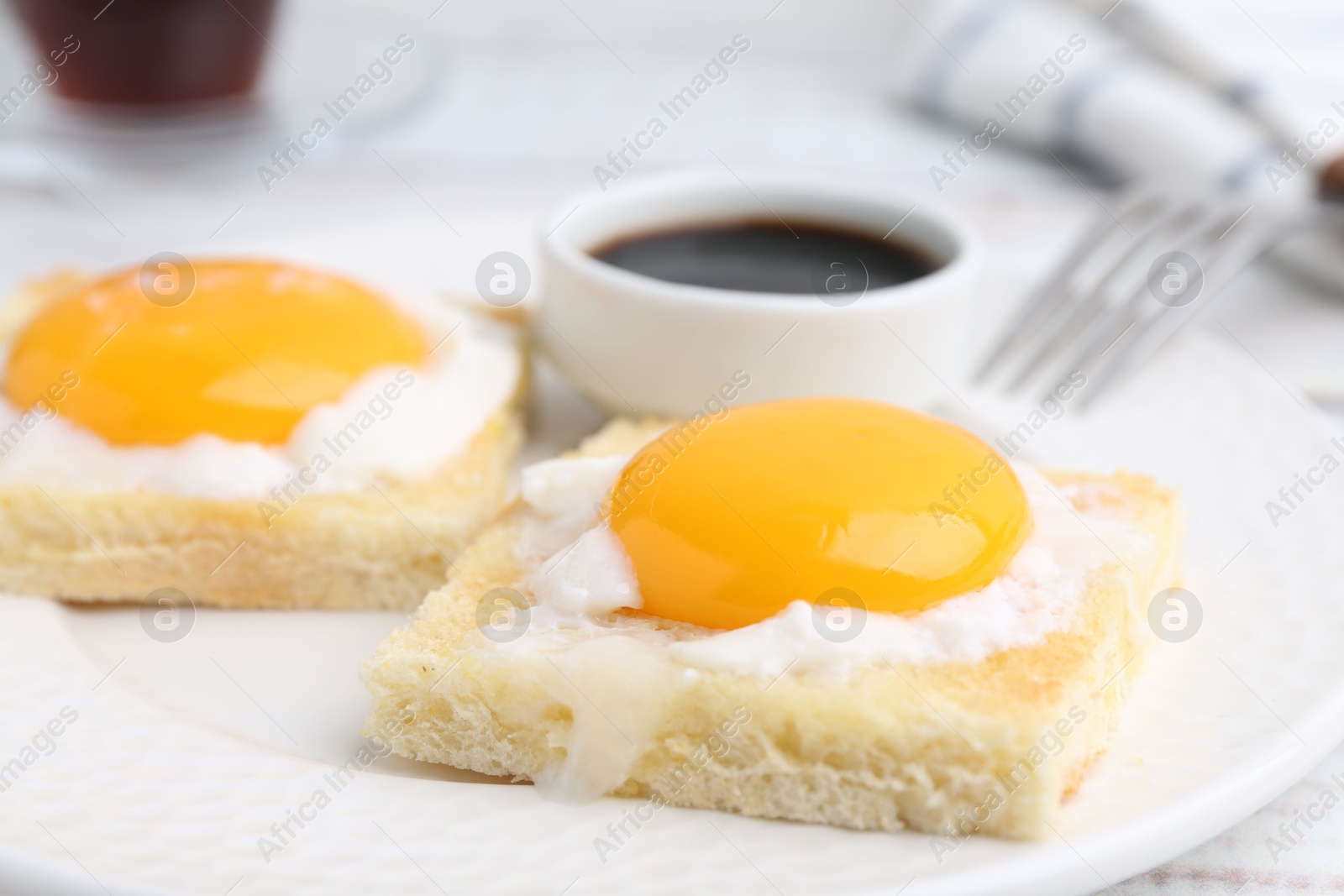 Tasty kaya toasts with half-boiled eggs served on table, closeup. Traditional asian breakfast Photo of Tasty kaya toasts with half-boiled eggs served on table, closeup. Traditional asian breakfast