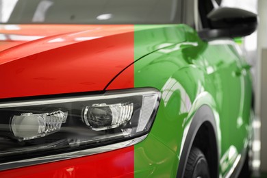 Image of Modern red auto before and green after painting, closeup. Comparative collage of car repaint