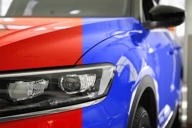 Image of Modern red auto before and blue after painting, closeup. Comparative collage of car repaint