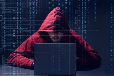 Image of Cyber attack. Hacker working on laptop against dark background. Digital codes around him