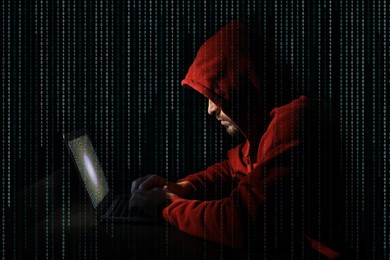 Image of Cyber attack. Hacker working on laptop against black background. Binary code around him