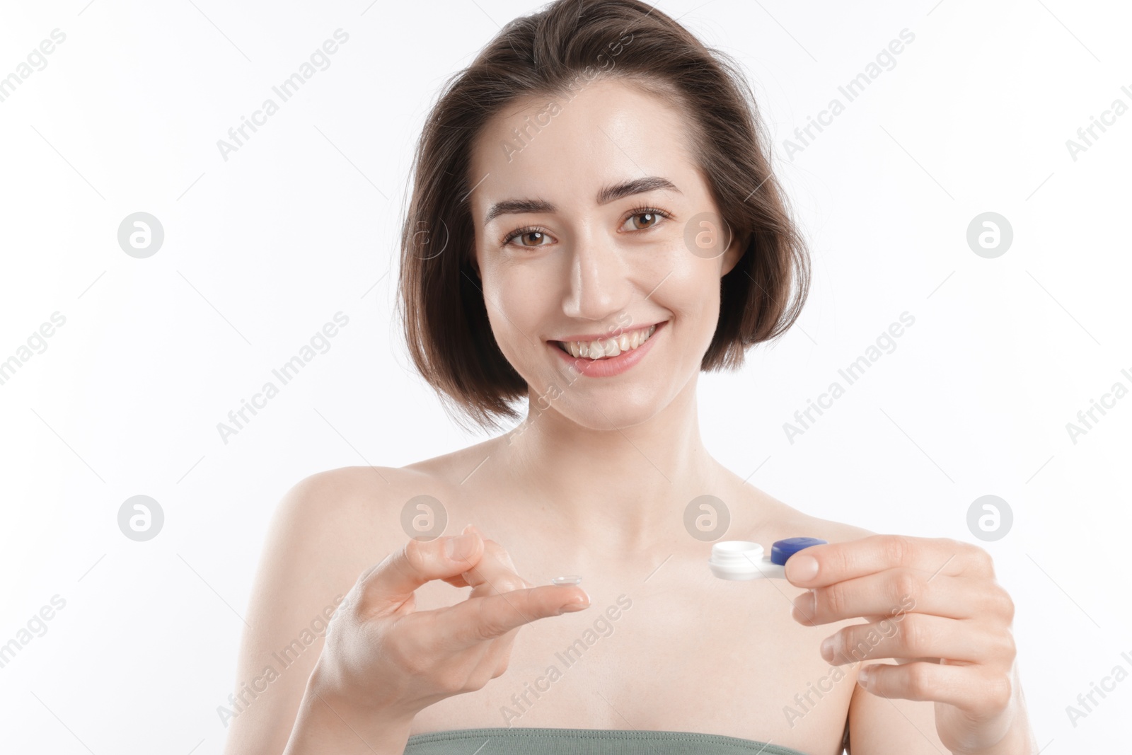 Woman with contact lens and case on white background Photo of Woman with contact lens and case on white background