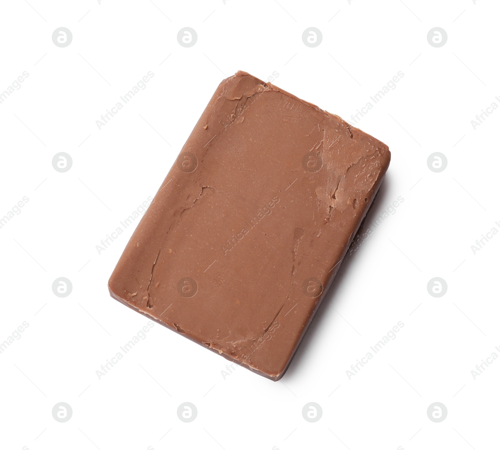 Block of tasty chocolate butter isolated on white, top view Photo of Block of tasty chocolate butter isolated on white, top view