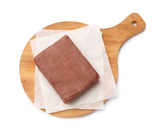 Photo of Block of tasty chocolate butter isolated on white, top view