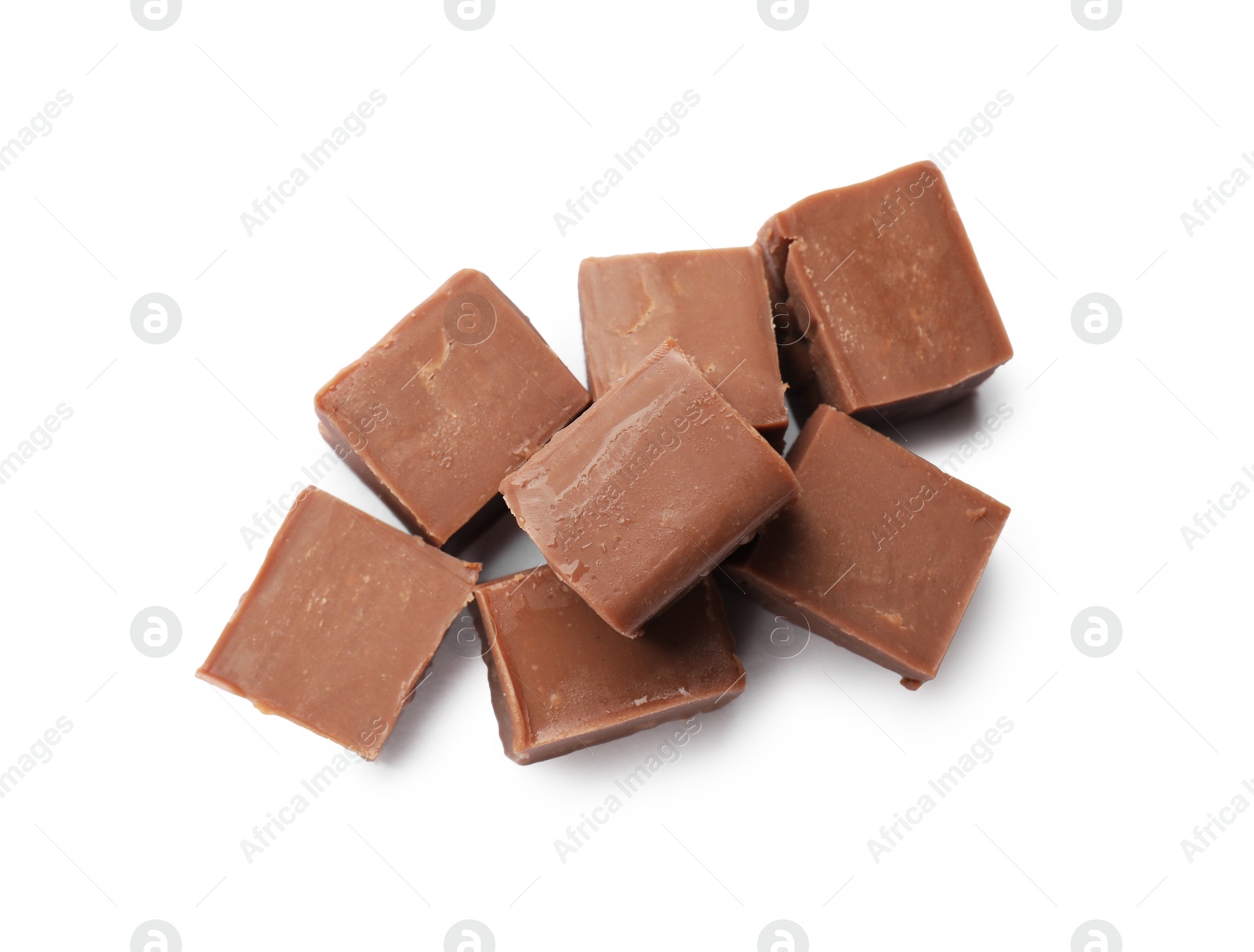 Pieces of tasty chocolate butter isolated on white, top view Photo of Pieces of tasty chocolate butter isolated on white, top view