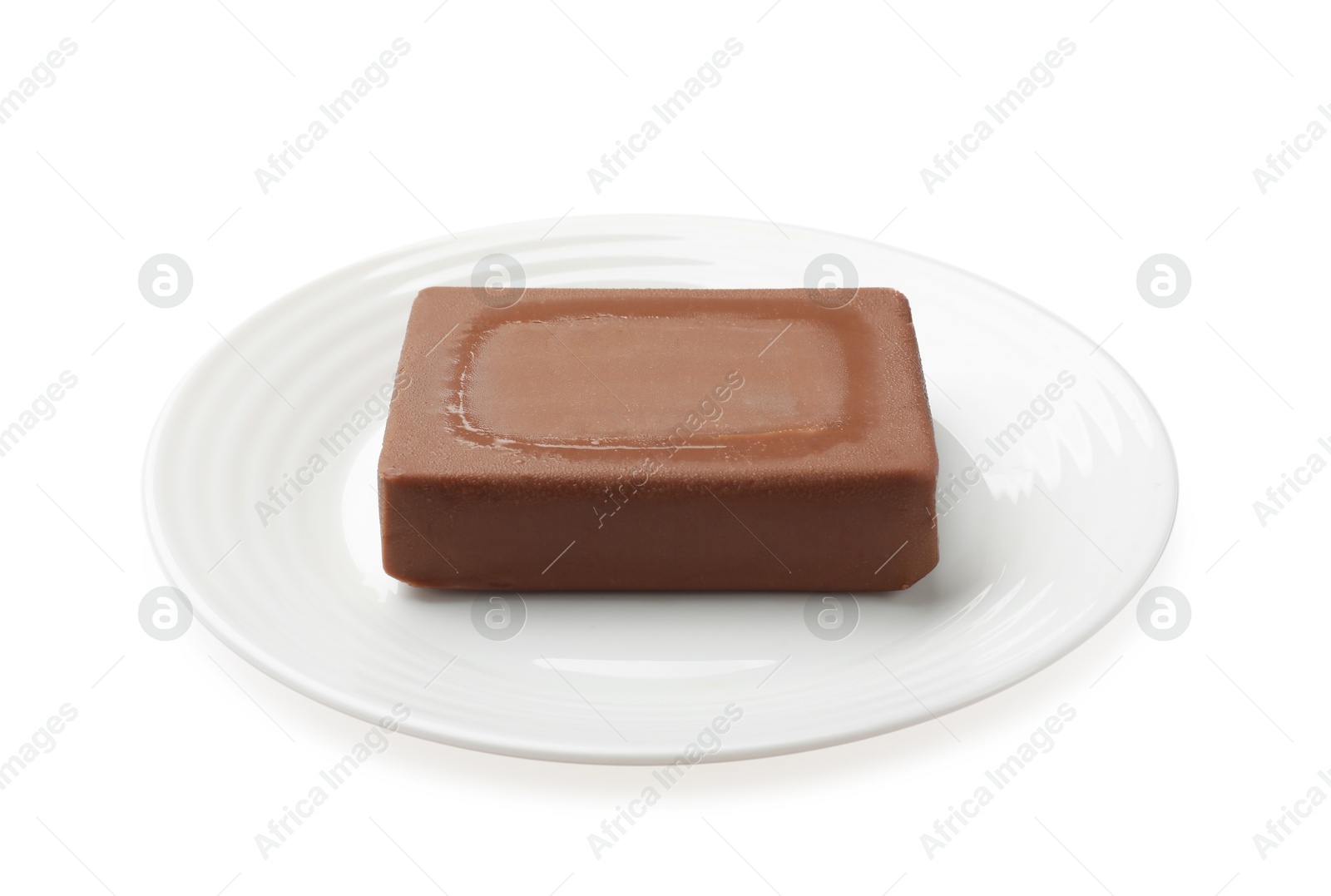 Block of tasty chocolate butter isolated on white Photo of Block of tasty chocolate butter isolated on white