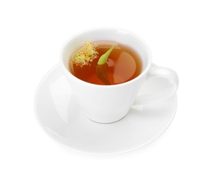 Photo of Tasty linden tea in cup, leaves and flowers isolated on white