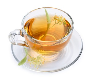 Photo of Tasty linden tea in cup, leaves and flowers isolated on white
