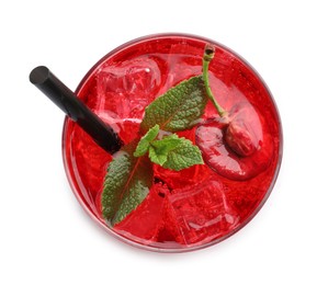 Photo of Tasty cherry soda water with ice cubes, berries and mint isolated on white, top view