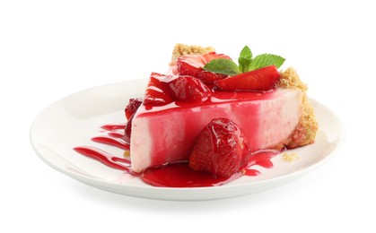 Photo of Piece of tasty cheesecake with strawberries, sauce and mint isolated on white