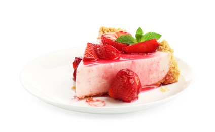Photo of Piece of tasty cheesecake with strawberries, sauce and mint isolated on white