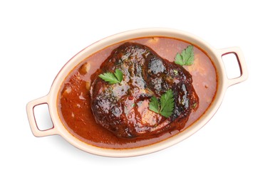 Photo of Traditional ossobuco dish with beef steak and sauce isolated on white, top view