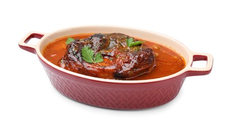 Photo of Traditional ossobuco dish with beef steak and sauce isolated on white