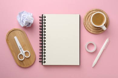 Photo of Flat lay composition with notebook on pink background