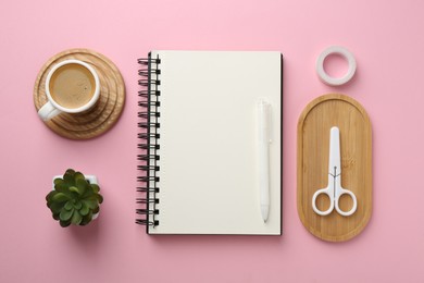 Photo of Flat lay composition with notebook on pink background