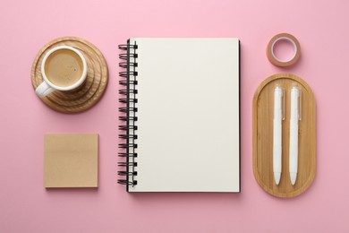 Photo of Flat lay composition with notebook on pink background