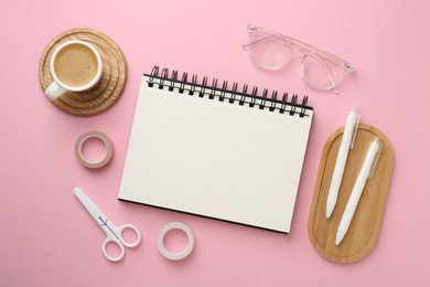 Photo of Flat lay composition with notebook on pink background