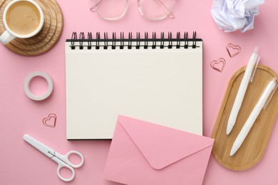 Photo of Flat lay composition with notebook on pink background