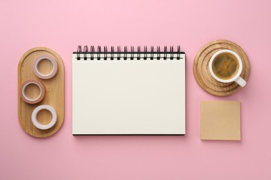 Photo of Flat lay composition with notebook on pink background