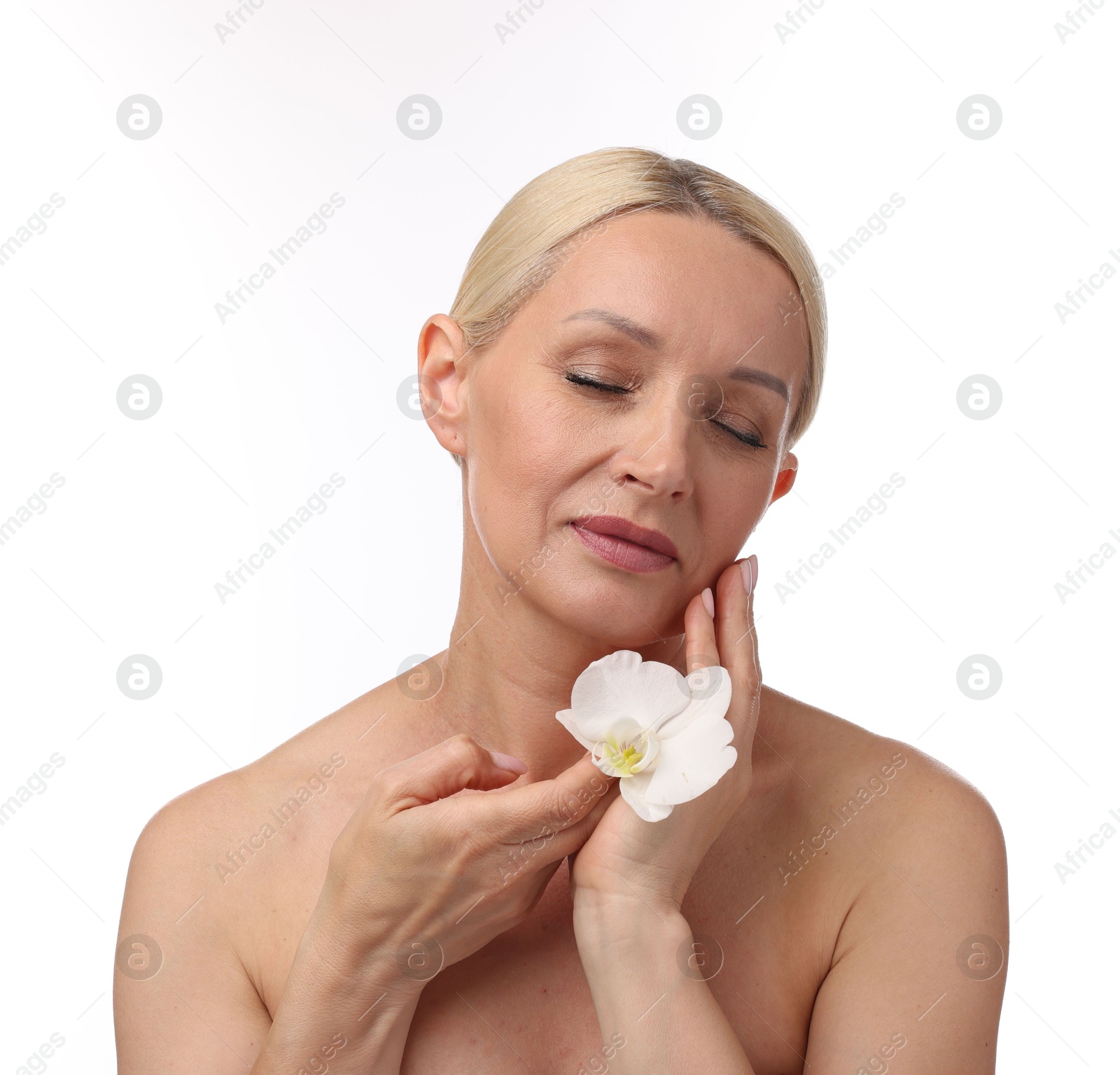 Beautiful woman with orchid flower on white background Photo of Beautiful woman with orchid flower on white background