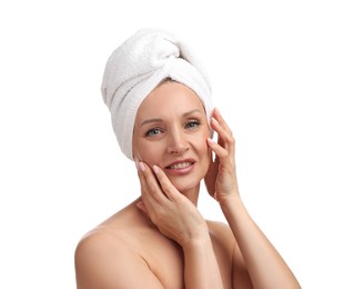 Photo of Beautiful woman with towel wrapped on her head against white background