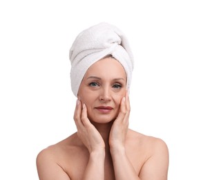 Photo of Beautiful woman with towel wrapped on her head against white background