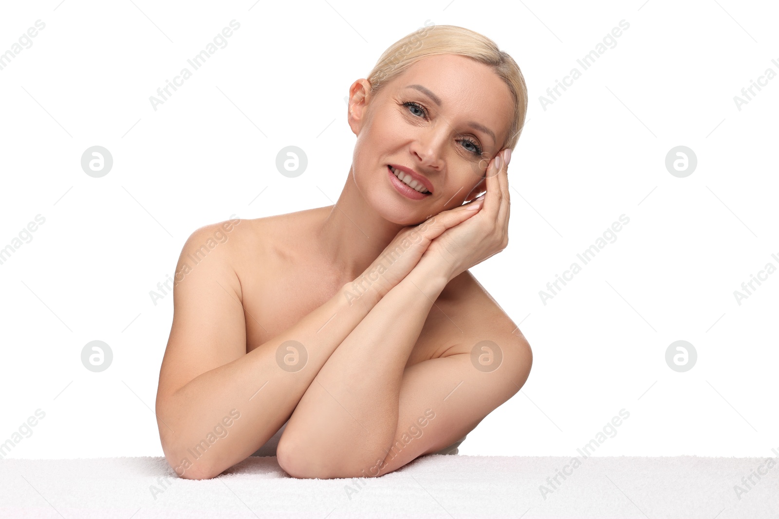 Portrait of beautiful woman with towel on white background Photo of Portrait of beautiful woman with towel on white background