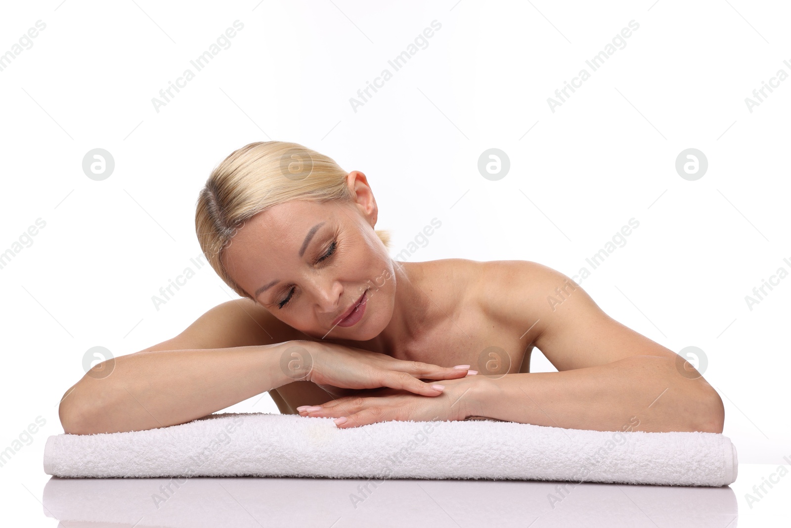 Portrait of beautiful woman with towel on white background Photo of Portrait of beautiful woman with towel on white background