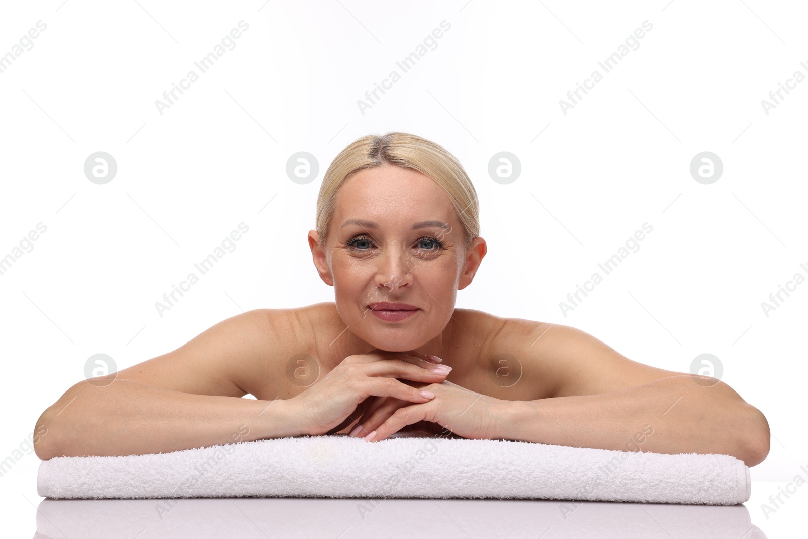 Portrait of beautiful woman with towel on white background Photo of Portrait of beautiful woman with towel on white background