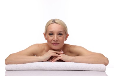 Photo of Portrait of beautiful woman with towel on white background