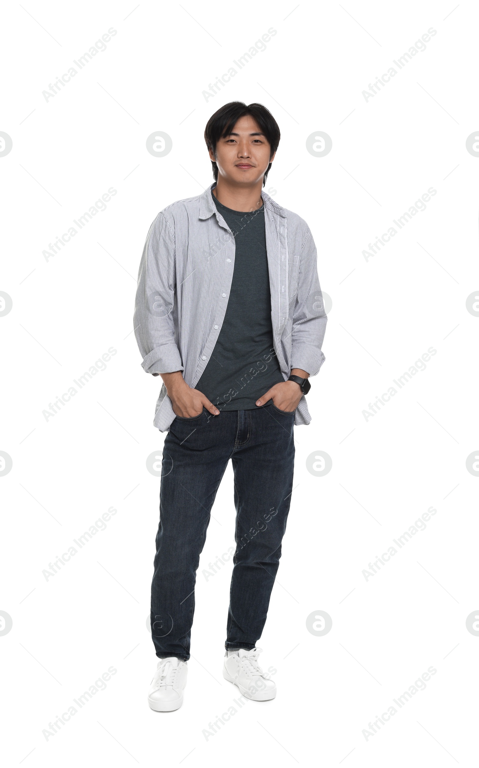 Handsome Asian man posing on white background Photo of Handsome Asian man posing on white background