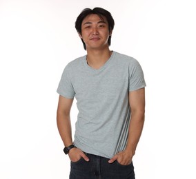Photo of Portrait of handsome Asian man on white background