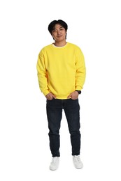 Photo of Handsome Asian man posing on white background