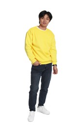 Photo of Handsome Asian man posing on white background
