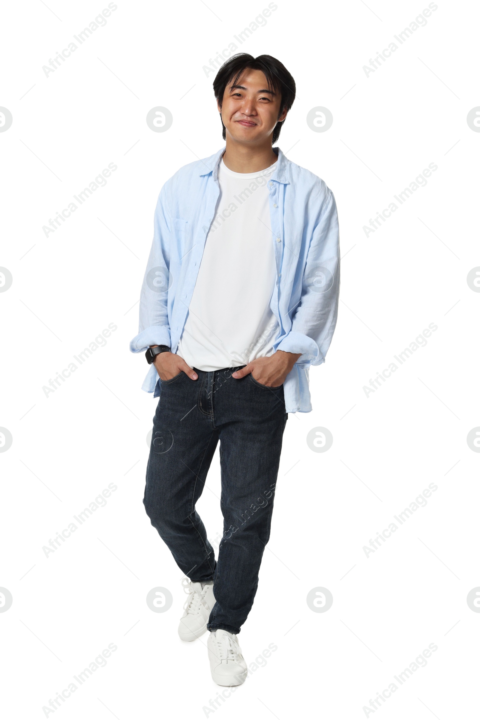Handsome Asian man posing on white background Photo of Handsome Asian man posing on white background